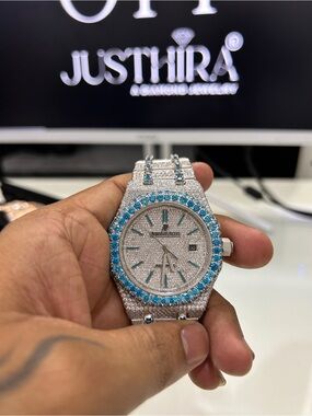 Audemars Piguet Silver Watch with Blue Accents